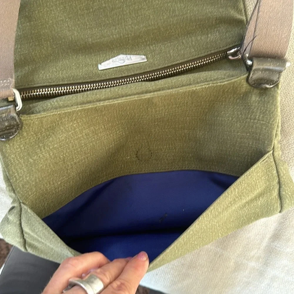 Kipling moss green with colbalt blue lining crossbody bag
